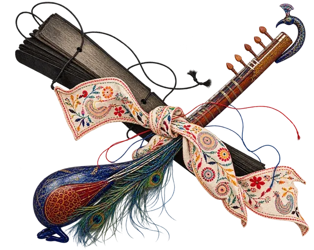 A bound palm-leaf manuscript and a peacock-headed lute cross, tied at the middle with a strip of kantha embroidery.